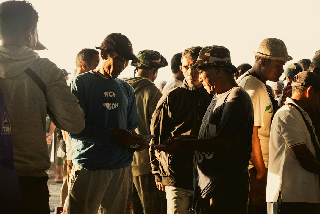 group of refugees talking