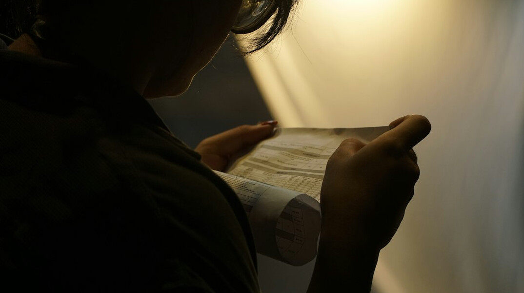 investigator reading documents