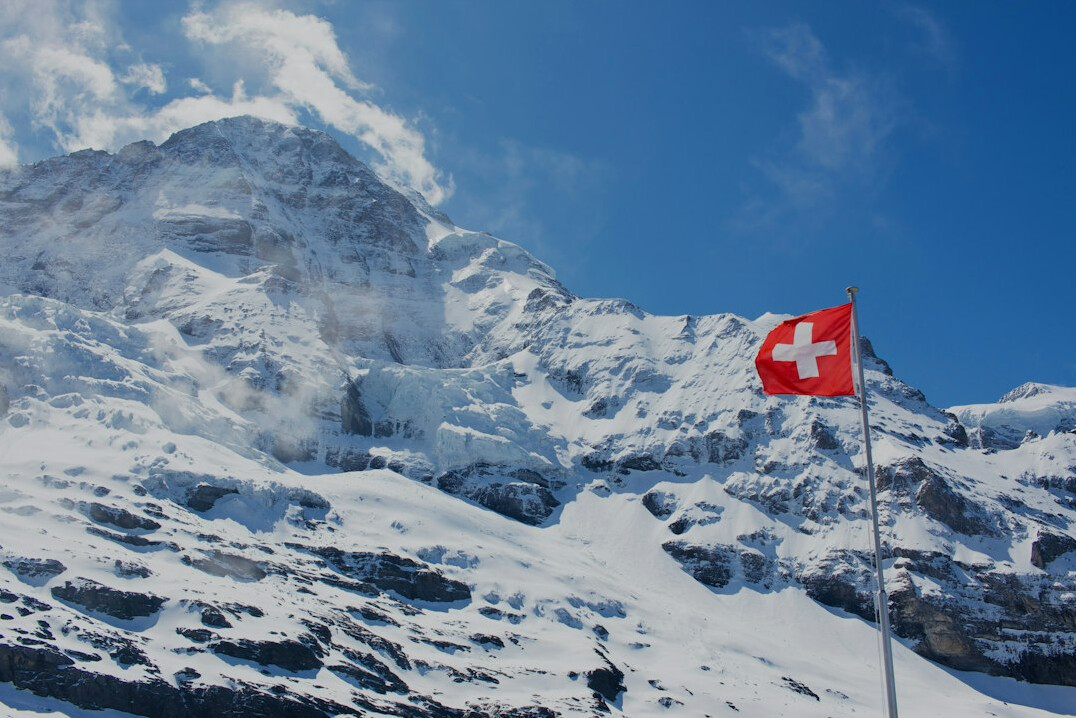 swiss landscape with flag